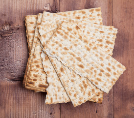 Matza on a wood background