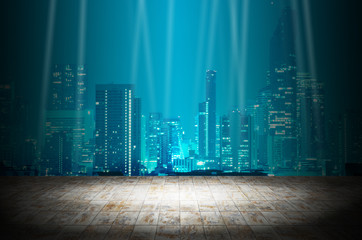 light in dark room with night modern city building background