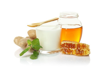 Natural ingredients for cough remedy on white background