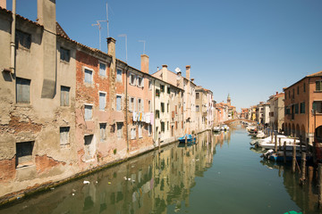 Characteristic canal in Chioggia, lagoon of Venice.