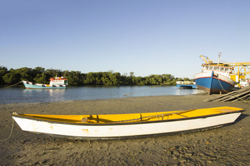 Fototapeta premium Guamaré, RN, Brazil (Fishing boats - sunset and sunshine)