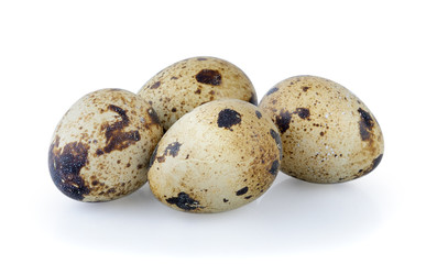  quail eggs isolated on white background