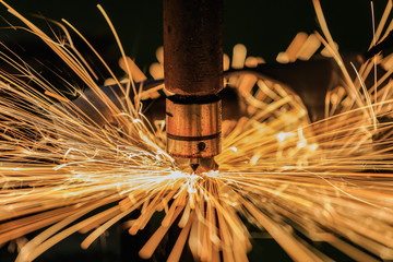 Spot machine is welding nut to auto part
