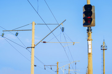 Traffic light shows red signal on railway