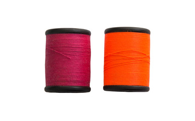 Thread bobbin isolated on white background.