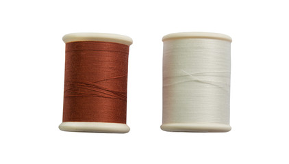 Thread bobbin isolated on white background.