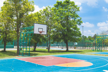 Basketball court in the garden and blue sky