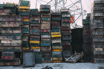 Beijing , China - Dec 21, 2014: colorful crates massive stacked on wooden pallets in a market. the pallets shown the name of owerns