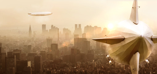 Airship over a city with sunset © Sven Bachstroem