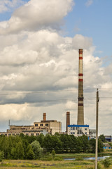 Fototapeta na wymiar Power plant in the background of beautiful clouds 