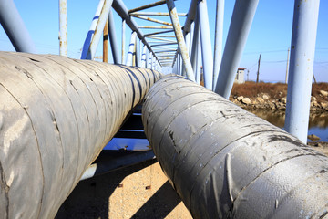 Oil field scene, oil pipelines and facilities