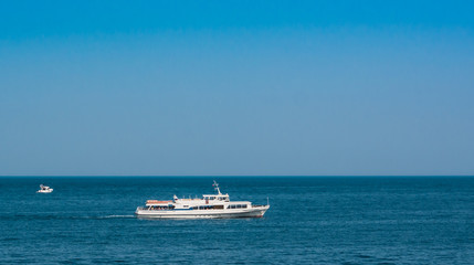 Fototapeta na wymiar ship and boat in blue sea