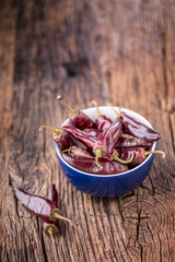 Chili.Red chili peppers on wooden table. Selective focus.