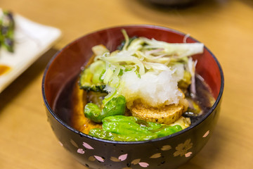 Japanese vegetable soup with pumpkin and okra.