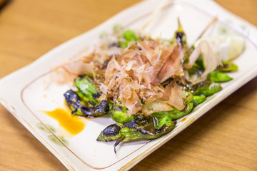 Appertizer, grilled okra with dried fish flake.