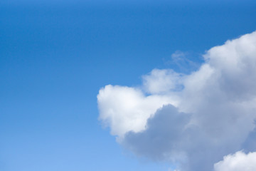 White clouds against a blue sky