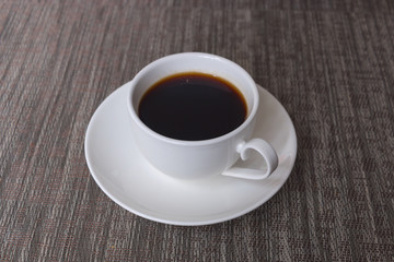 Cup of coffee on the table.