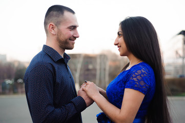 man asking his girlfriend if she wants to marry him