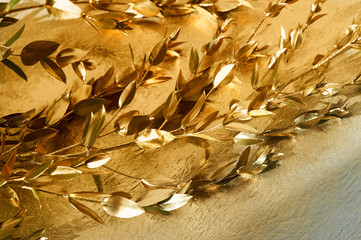 Branch painted in gold paint.abstract the image. Close