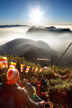 Fototapeta Sri Pada, Sri Lanka - 06 February, 2017: People tourists wait meet take pictures for the sunrise on mountain Sri Pada Adam's Peak. Sri Lanka.
