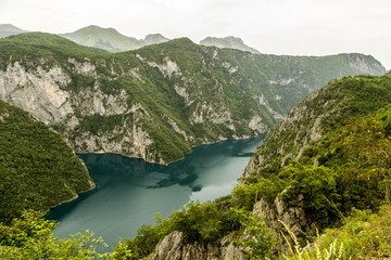 Montenegro. Durmitor National Park. Piva River Canyon. Piva is a river in Montenegro. The River originates on the slopes of Mount Sinjac. It flows in Montenegro, then in Bosnia and Herzegovina