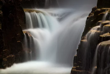 Zelfklevend Fotobehang Small waterfall in a crevice. Norway © ajwk