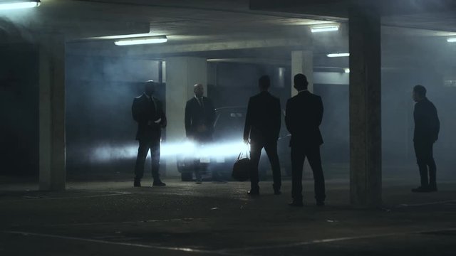  Asian & western organized criminal gangs meet in dark parking lot to do deal