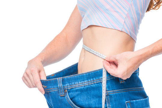 Measurement of the waist after weight loss, stomach close-up