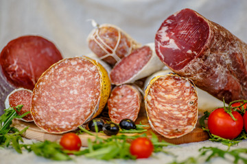 Various Italian sausages lying on the counter