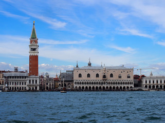 Venice san marco palace from the sea with clouds and blue sky