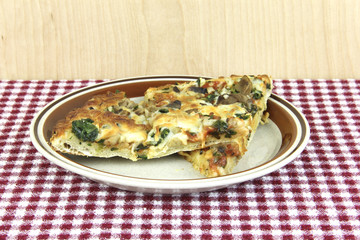 Vegetable Pizza Pieces on a Plate