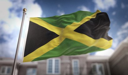 Jamaica Flag 3D Rendering on Blue Sky Building Background