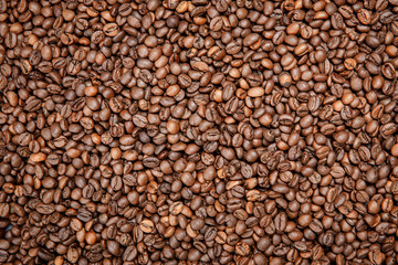 Roasted coffee beans, can be used as a background.