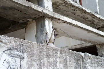 Earthquakes damage building frames and columns