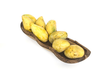 many ripe mango in wood bow