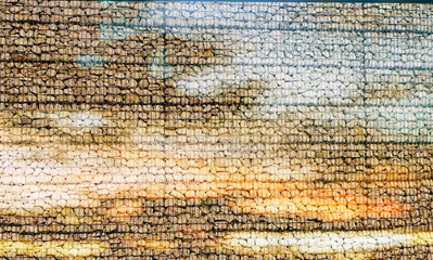 Stones wall background overlay with blurred sky on sunset background