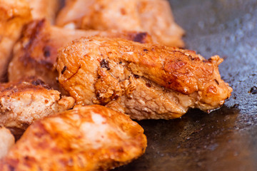 The meat is cooked in a cauldron