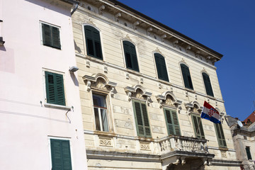Old building with flag in Rovinj, Croatia