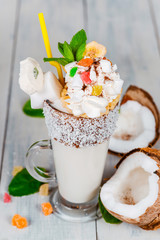 Milkshake on wooden background
