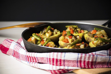 Baked potatoes stuffed with vegetables