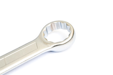 metal chrome wrench on white background