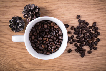 coffee beans and cup full of coffee