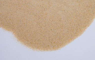 closeup of sand background pattern of a beach in the summer