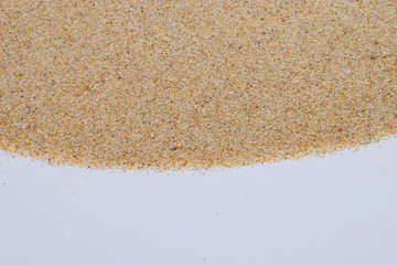 closeup of sand background pattern of a beach in the summer
