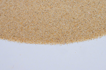 closeup of sand background pattern of a beach in the summer