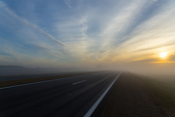 Freeway and a car in fog