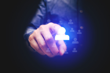 Businessman pointing people icon with human resource concept.