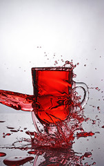 Splash in glass of mulled wine