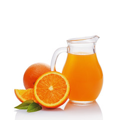 Naklejka na ściany i meble Glass jug of juice with slice of orange