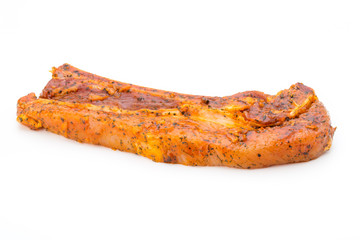 Spicy marinated spare ribs barbecued on the white background.
